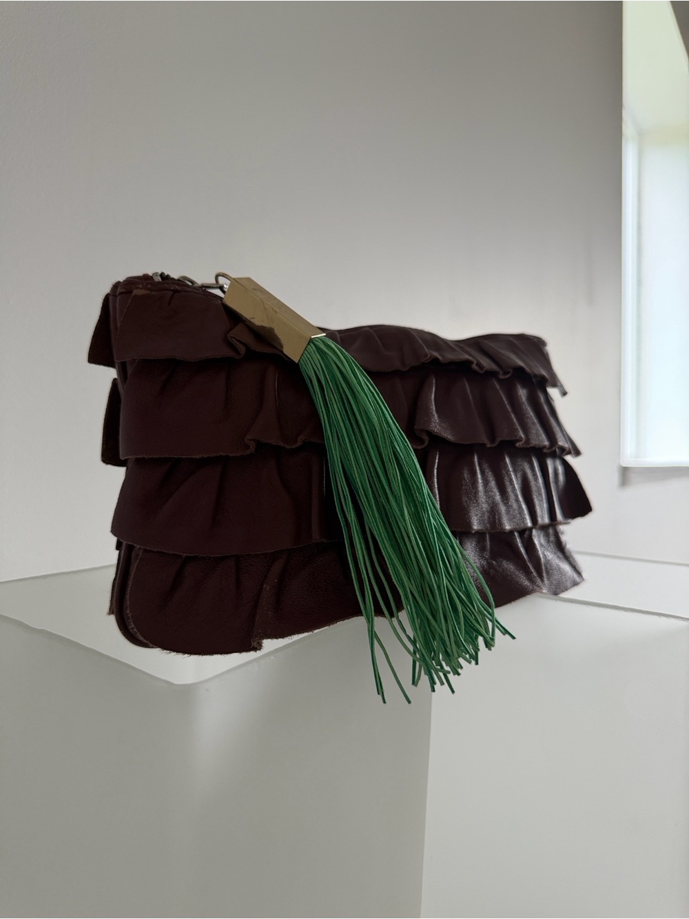 Ruffled Brown Leather Clutch with Green Tassel Accent